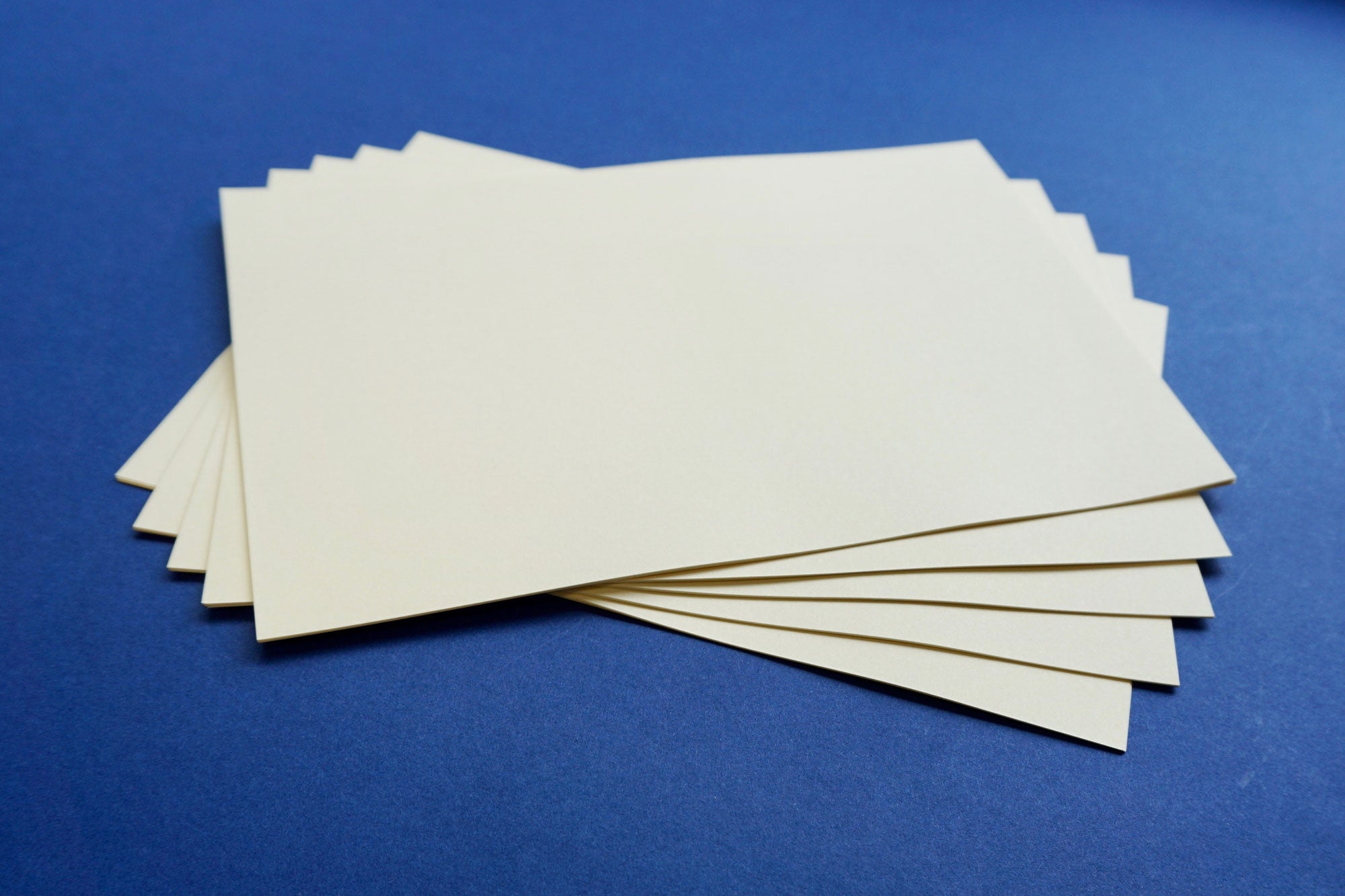 Cream plain A5 paper for bookbinding short grain from Bookshell Bindery