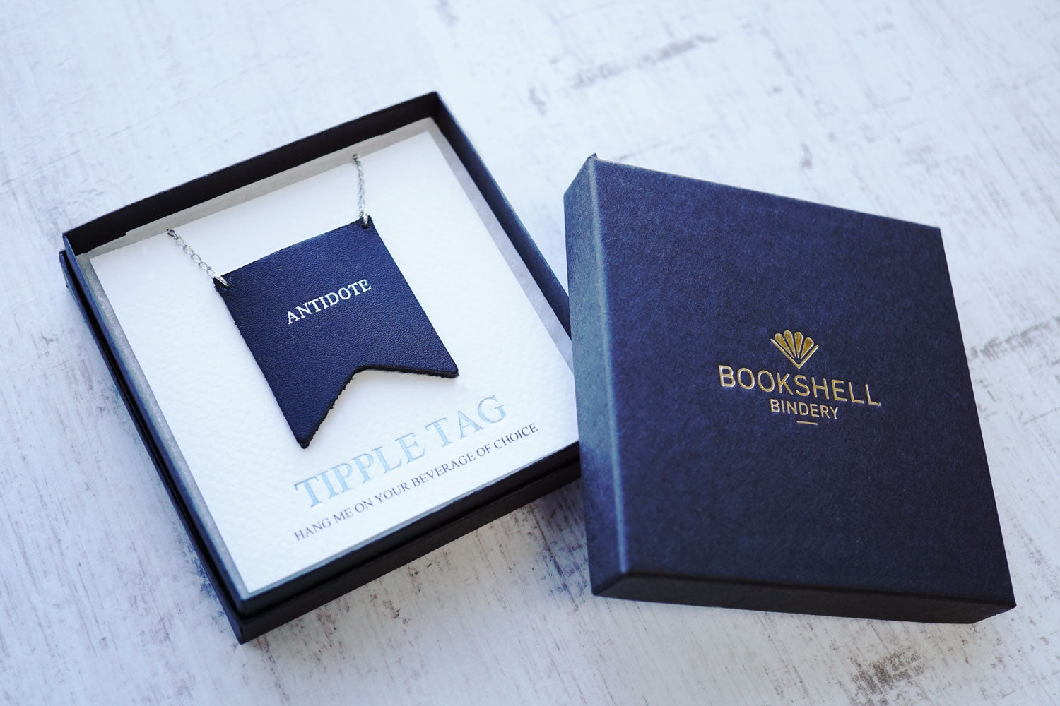 Custom decanter tags from Bookshell Bindery are ready to gift in a beautiful gift box
