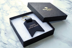 Personalised Keyrings for Dad from Bookshell Bindery, personalised with the phrase Daddy's Aston Martin
