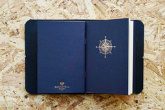 Never-ending journal - Seas the day, leather travel journal, with 3 A6 pocket size inner notebooks, this photo shows the compass illustration embossed in gold foil onto the cover