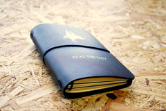 Never-ending journal - Seas the day, leather travel journal, A6 pocket size with boat illustration embossed in gold foil onto the cover