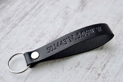 Leather keyring with custom coordinates in black leather