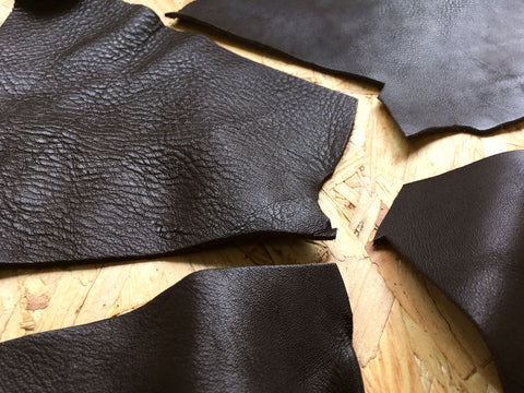 Showing the texture of the Scrap Leather Offcuts – Dark Brown Cowhide Leather Pieces