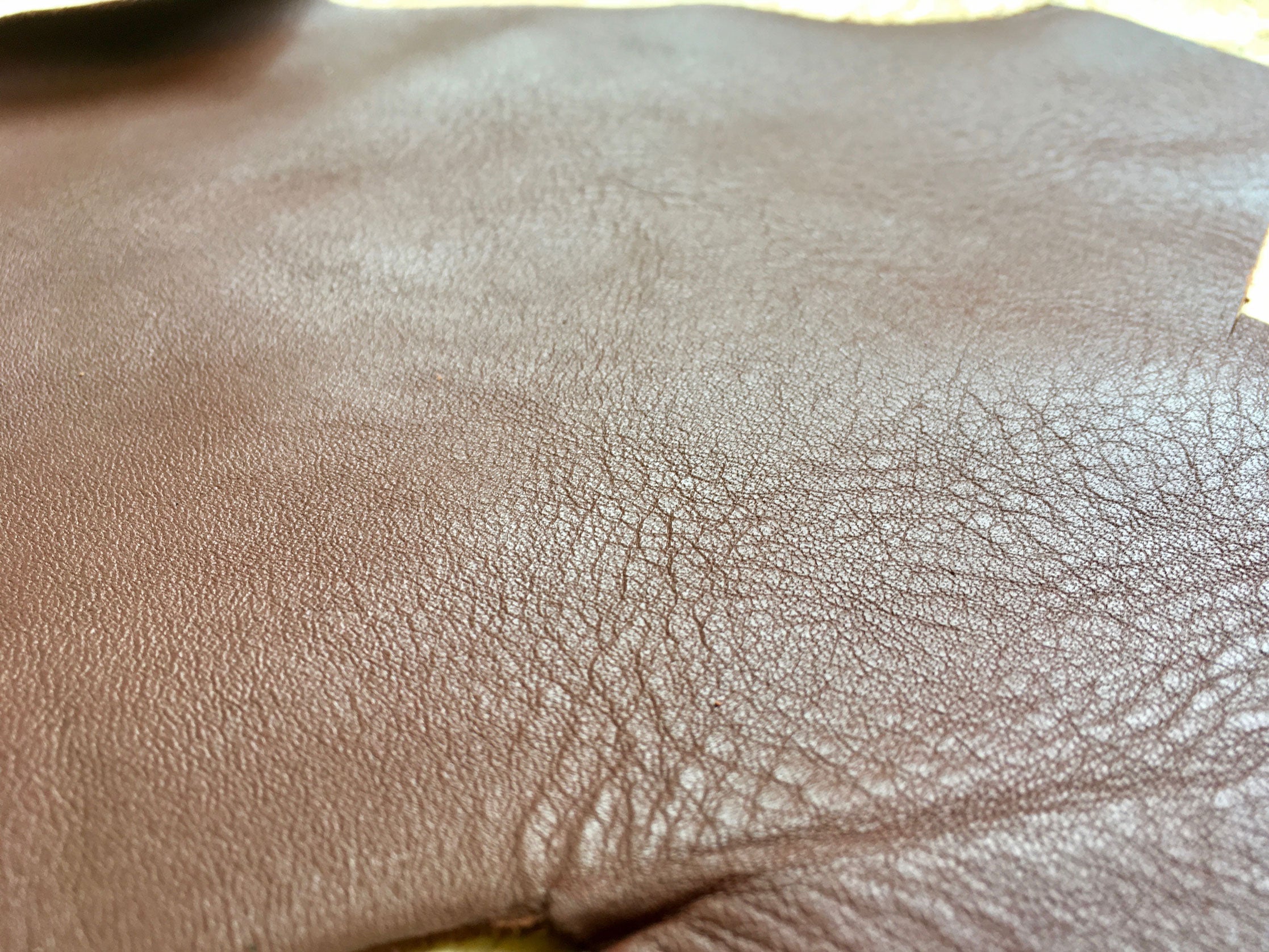 Texture of Scrap Leather Offcuts – Light Brown Cowhide Leather Pieces by Bookshell Bindery