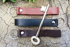 Leather key chain from Bookshell available in light brown, dark brown and black leather