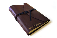 Men's journal in light brown leather from Bookshell bindery can be personalised with your choice of title