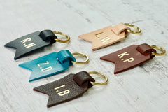 Monogram keychain from Bookshell bindery available in black leather, turquoise blue leather, dark brown leather, light brown leather, Natural (pale pink)