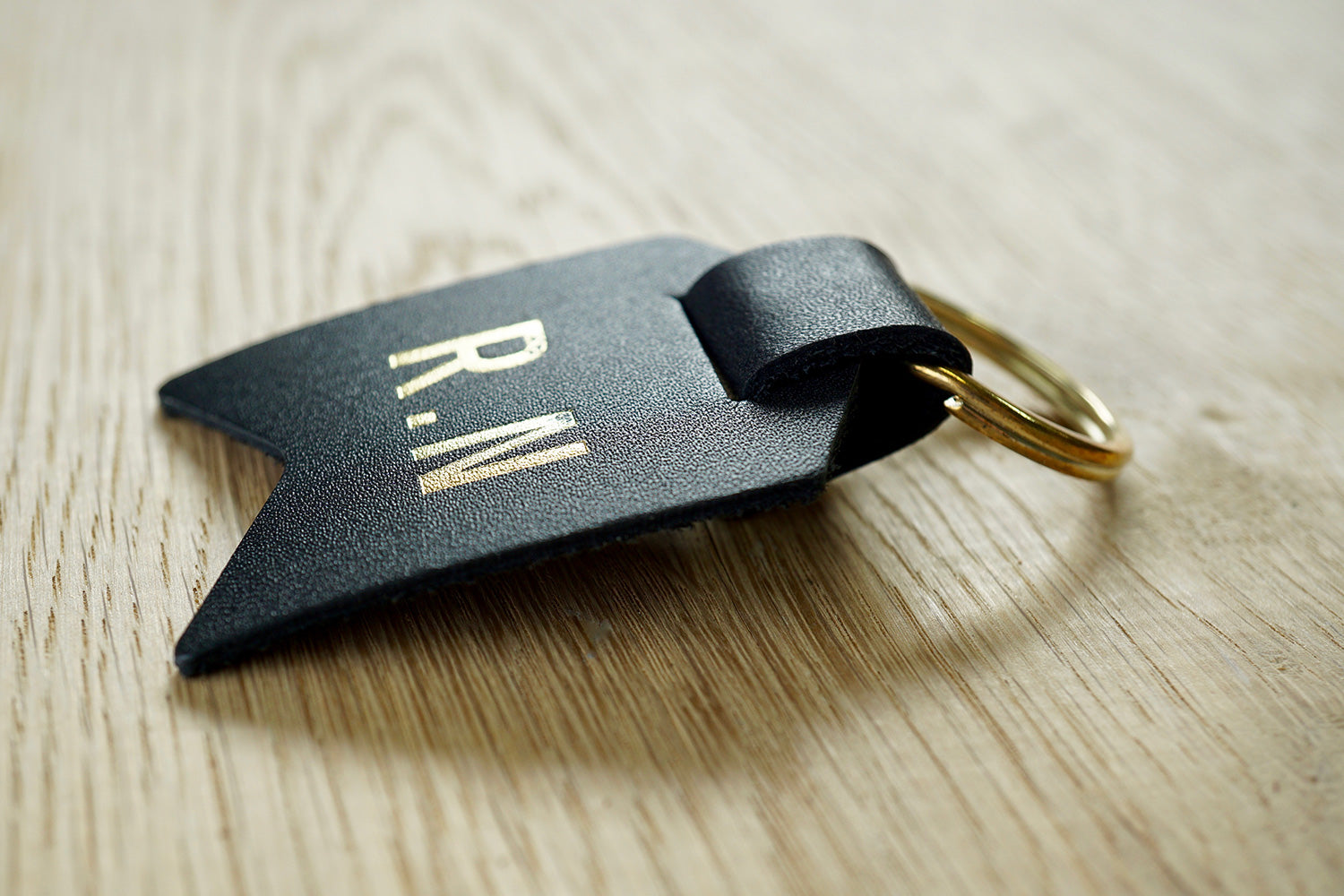 Monogram keychain from Bookshell bindery can monogrammed with 1 or 2 initials