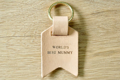 Mum keychain from Bookshell Bindery embossed with gold foil, Worlds Best Mummy in natural pale pink leather