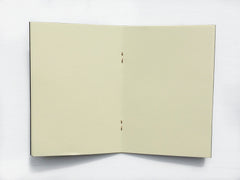 Pocket notebook with blank pages from Bookshell Bindery