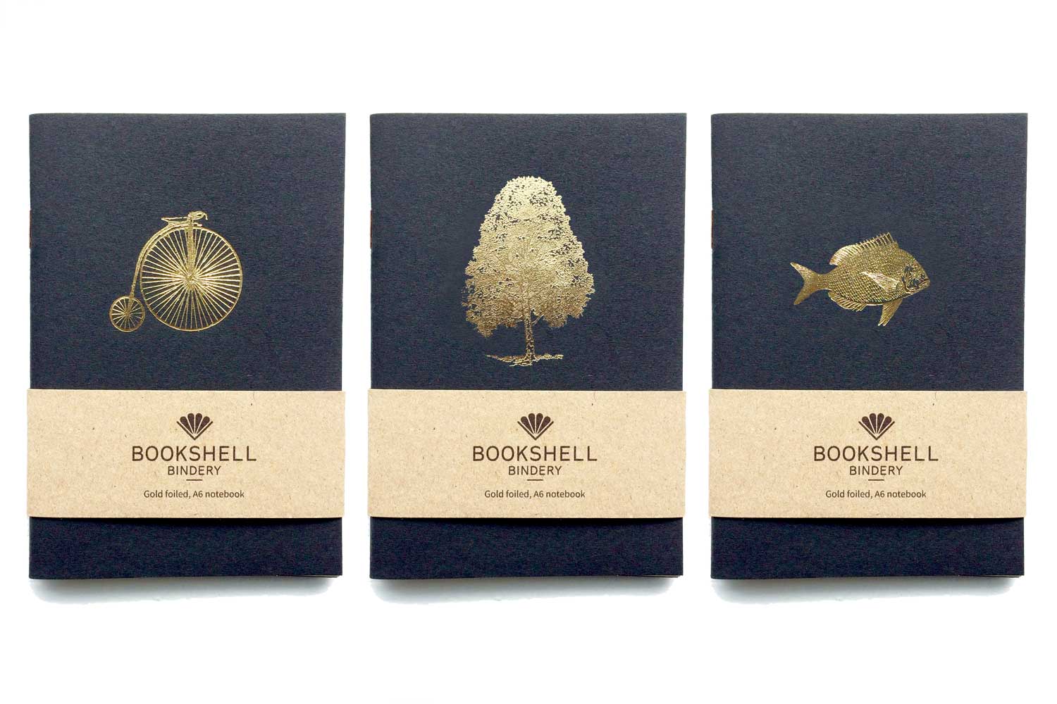 Pocket notebook with choice of gold foil picture from Bookshell, oenny farthing, tree, fish