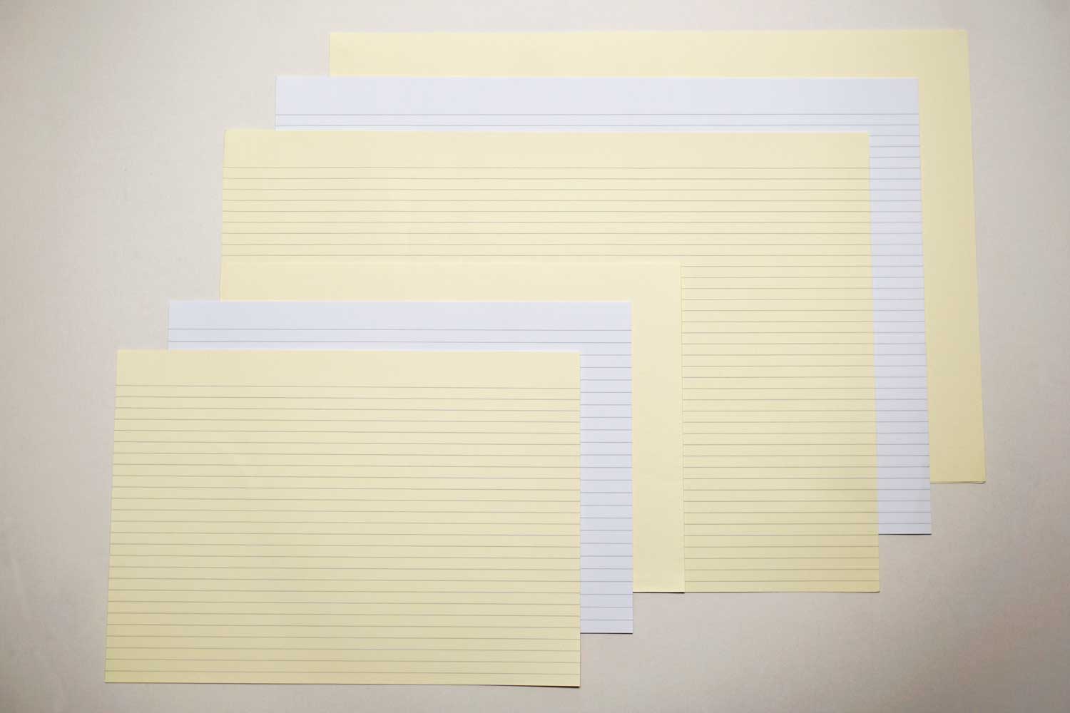 Short grain bookbinding paper, lined, in cream and white from Bookshell