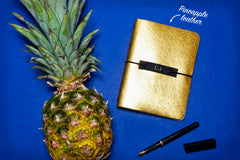 what3words Vegan Leather Journal in gold smooth pineapple leather